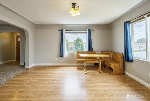 a room with furniture and window