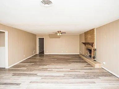 4309 42nd Street Lubbock, TX 79413 - Photo 21 of 21 a view of a livingroom with a fireplace