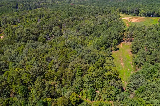 a view of a lake with a house