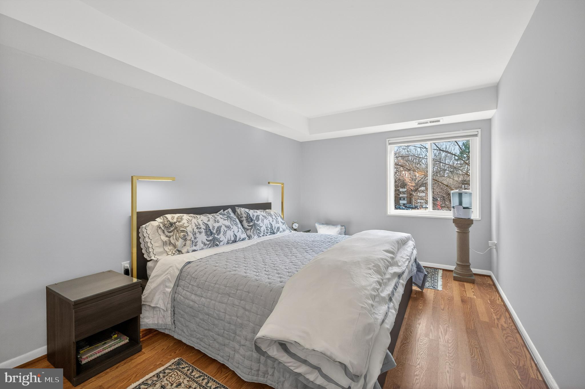 1536 Northgate Square, Unit 21 Reston, VA 20190 - Photo 18 of 50 a bedroom with a bed and a window