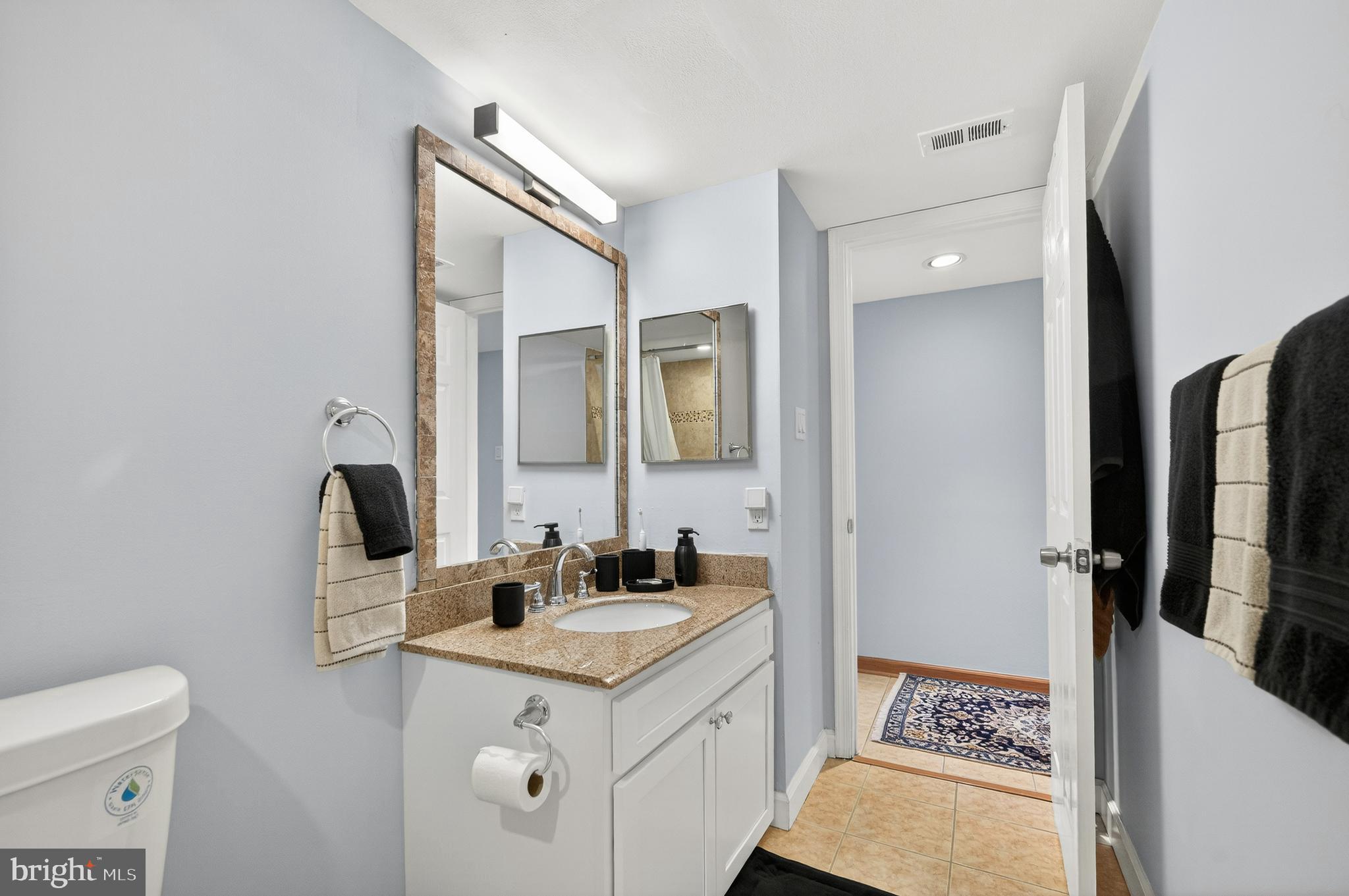 1536 Northgate Square, Unit 21 Reston, VA 20190 - Photo 21 of 50 a bathroom with a sink toilet and shower