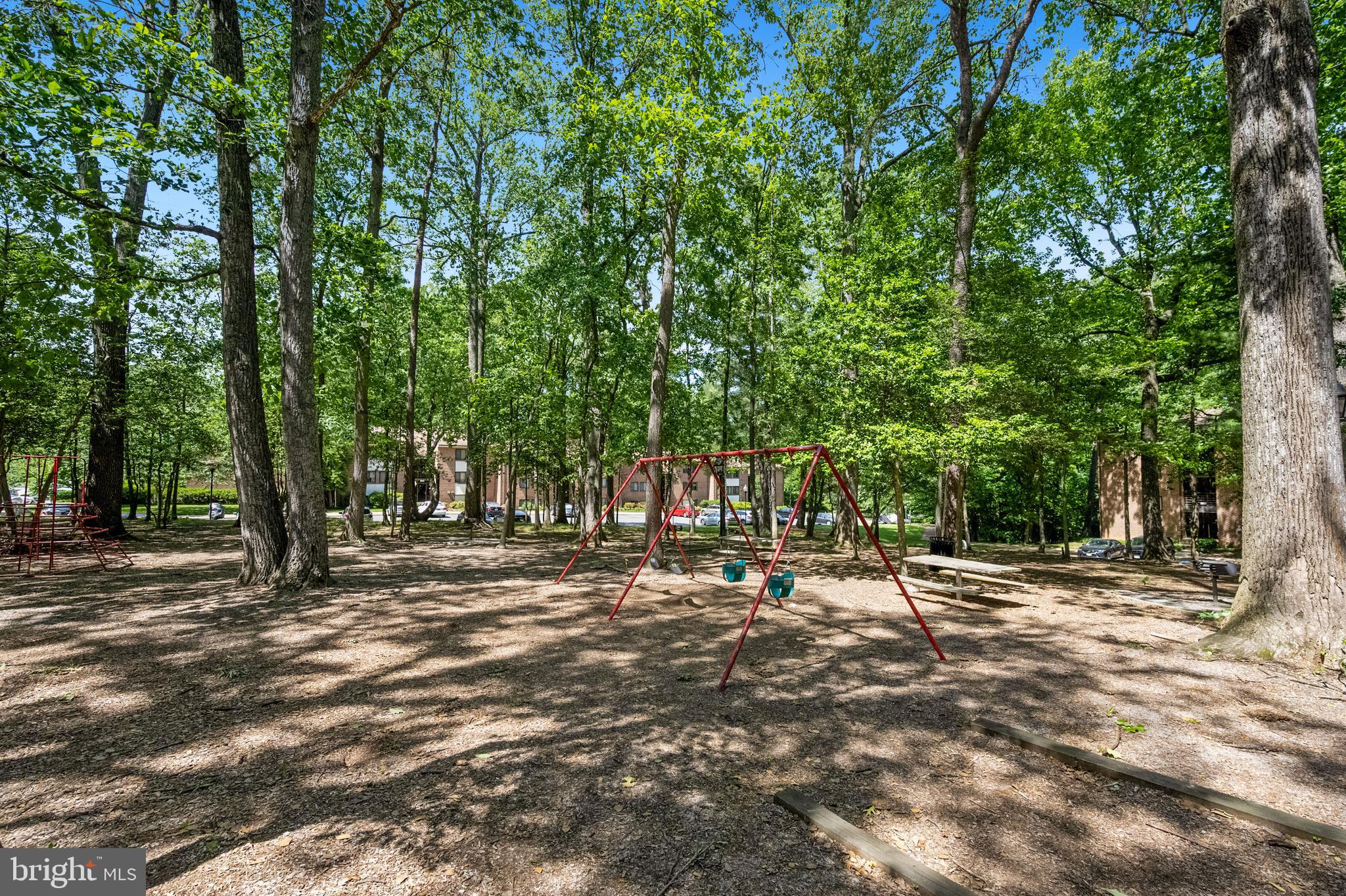 1536 Northgate Square, Unit 21 Reston, VA 20190 - Photo 24 of 50 a backyard of a house with trees