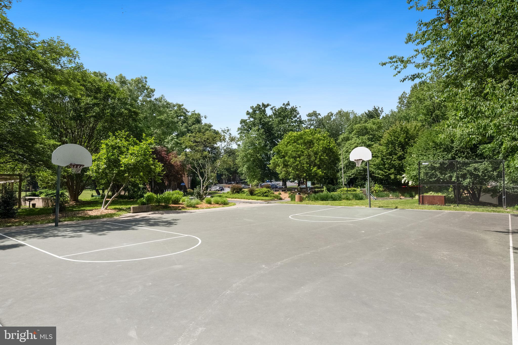 1536 Northgate Square, Unit 21 Reston, VA 20190 - Photo 30 of 50 a view of a playground with basketball court