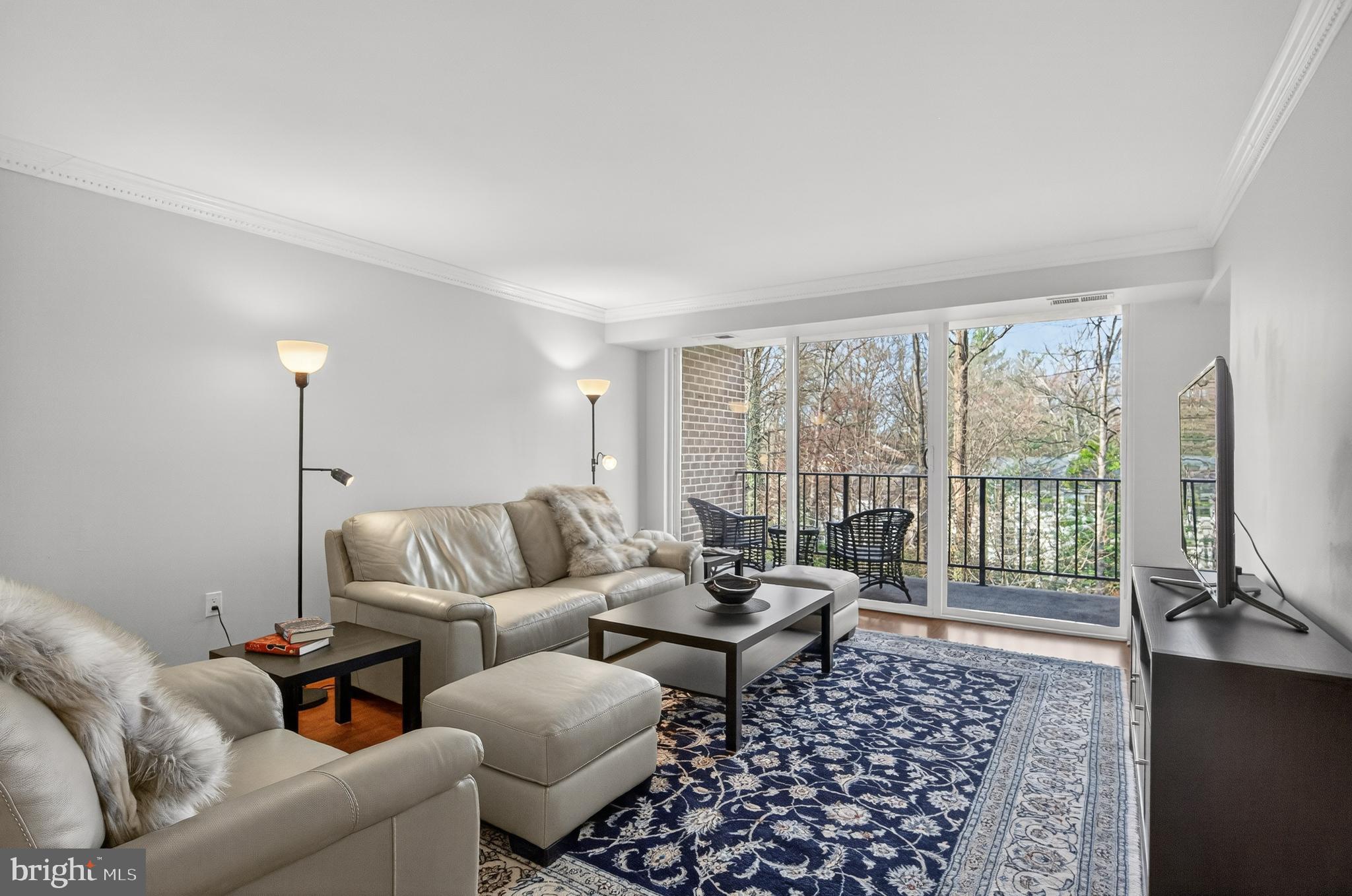 1536 Northgate Square, Unit 21 Reston, VA 20190 - Photo 3 of 50 a living room with furniture and a window