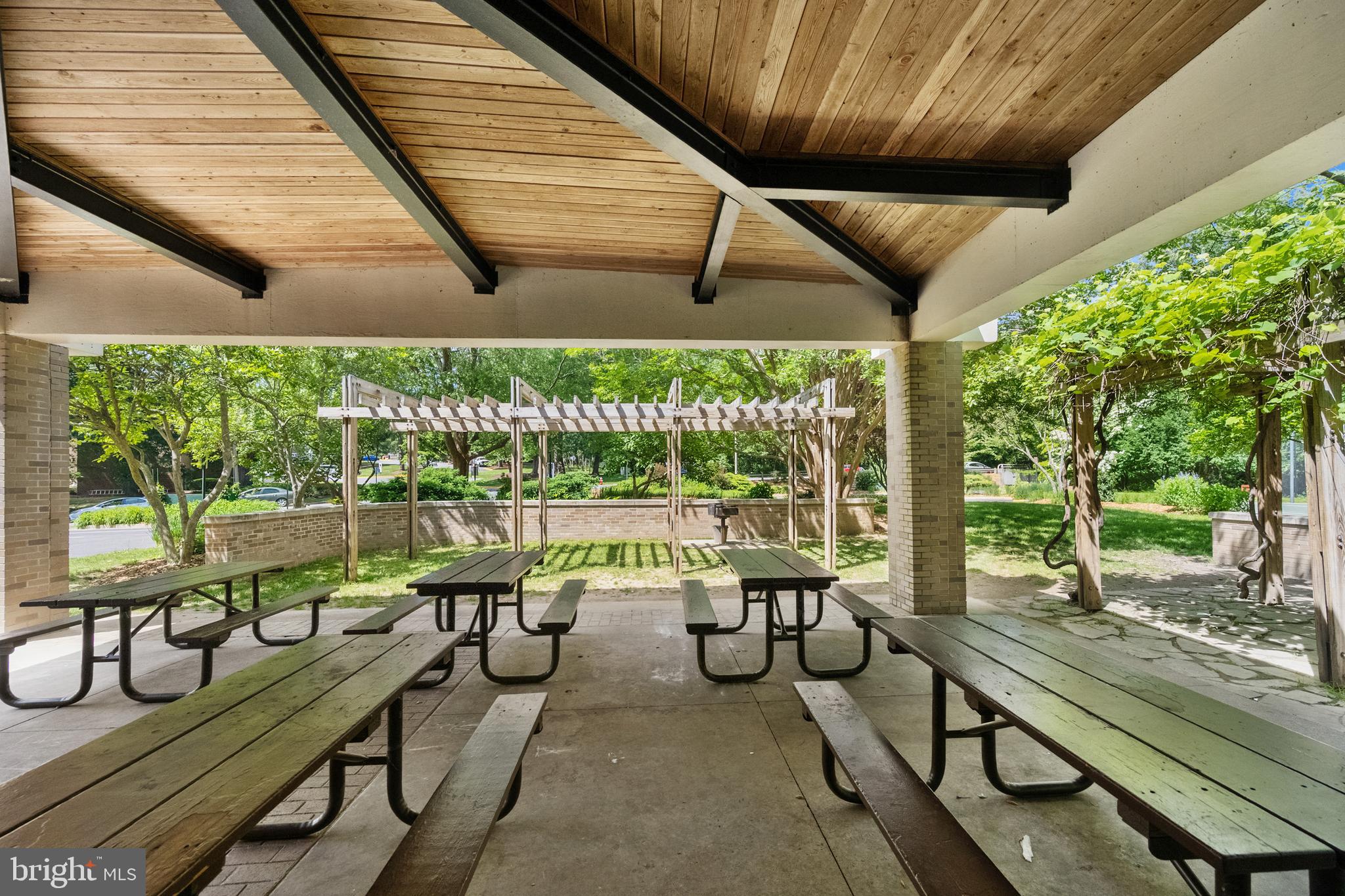 1536 Northgate Square, Unit 21 Reston, VA 20190 - Photo 31 of 50 a view of swimming pool with a patio
