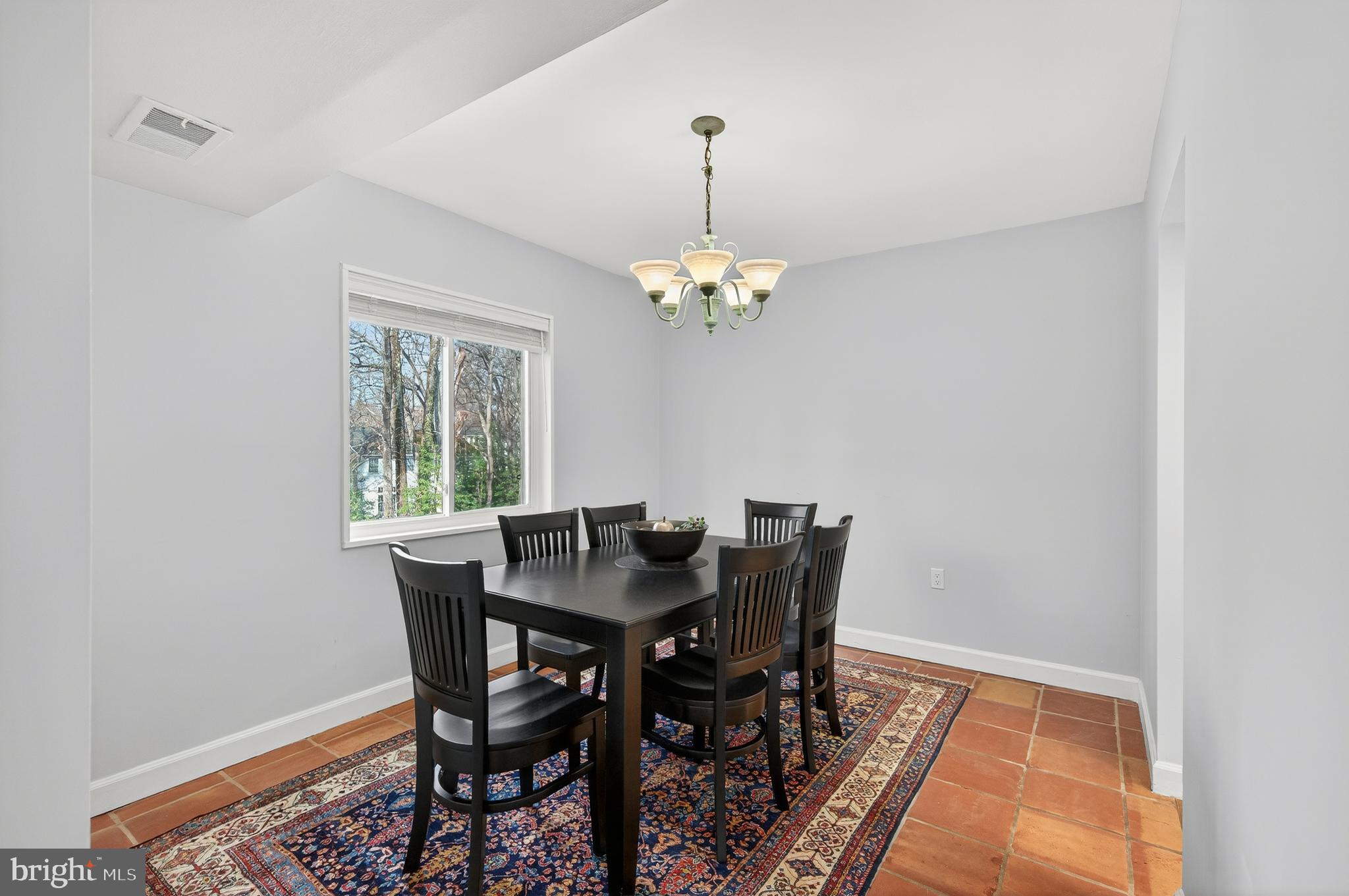 1536 Northgate Square, Unit 21 Reston, VA 20190 - Photo 10 of 50 a view of a dining room with a table and chairs