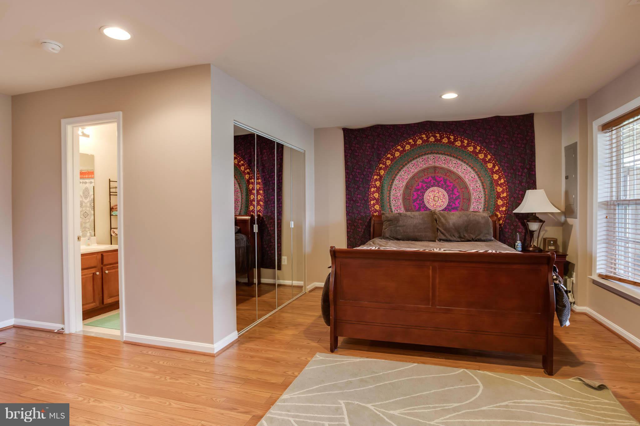 2242 Henry Watts Loop Woodbridge, VA 22191 - Photo 26 of 30 a living room with furniture and wooden floor