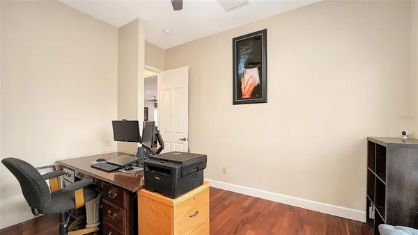 a bedroom with a bed and a fireplace