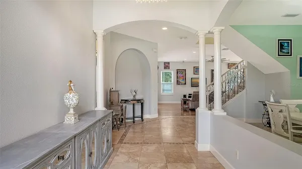 a view of entryway with livingroom and stairs