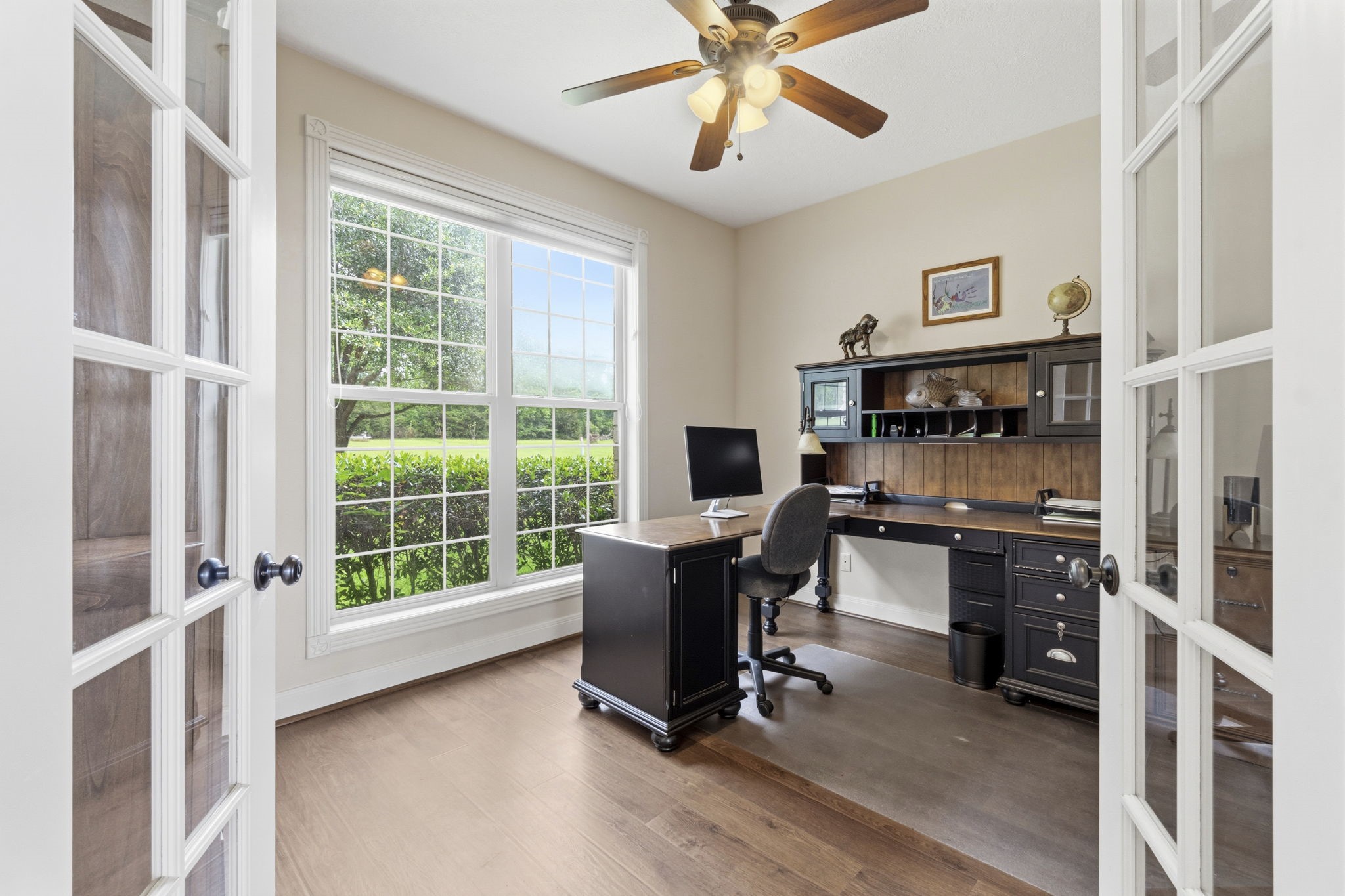 259 Memphis Bell Lane Trinity, TX 75862 - Photo 13 of 50 a view of a workspace with furniture and a window