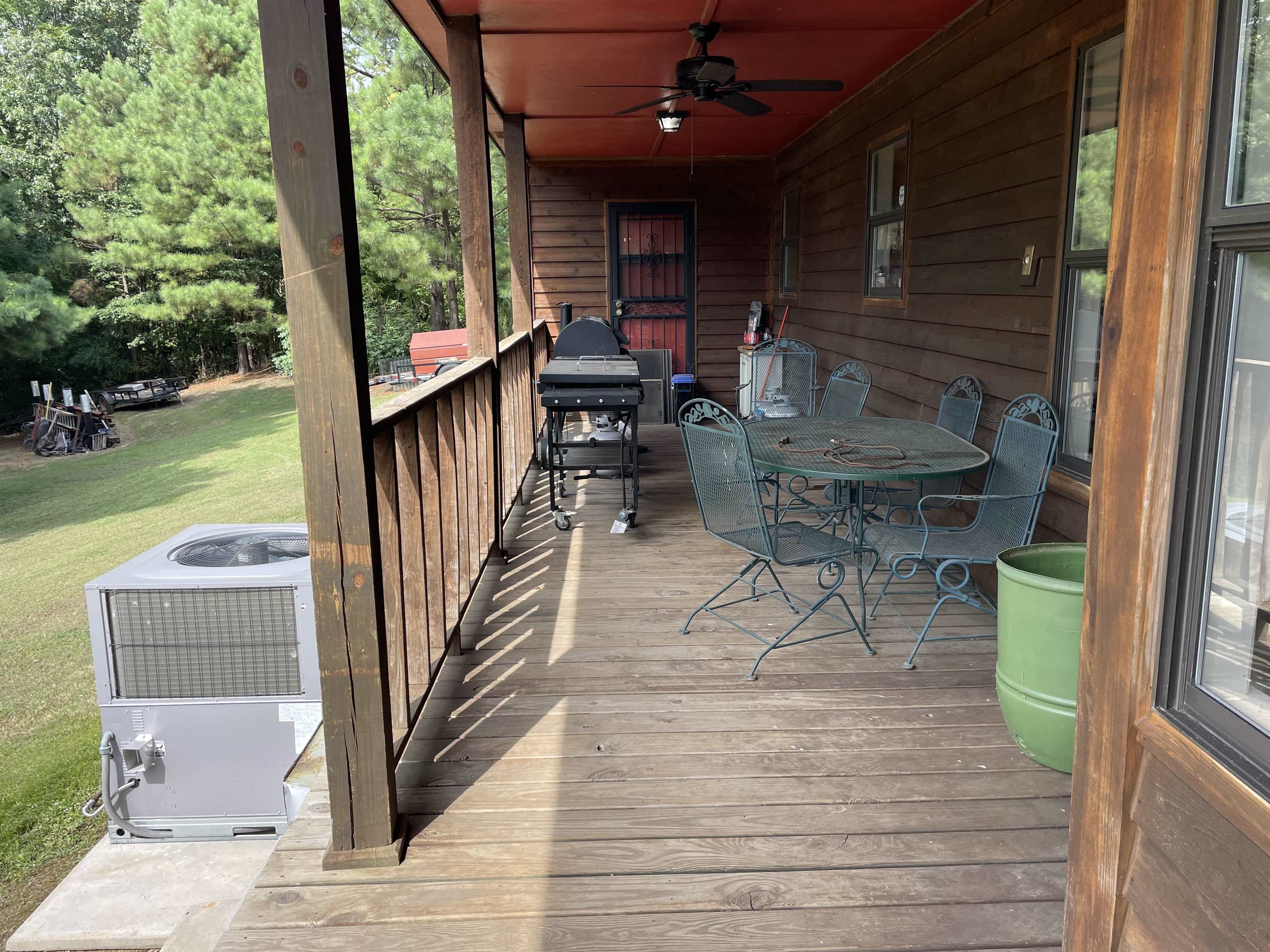 2879 Randolph Road Burlison, TN 38015 - Photo 5 of 29 Deck with ceiling fan and central AC unit