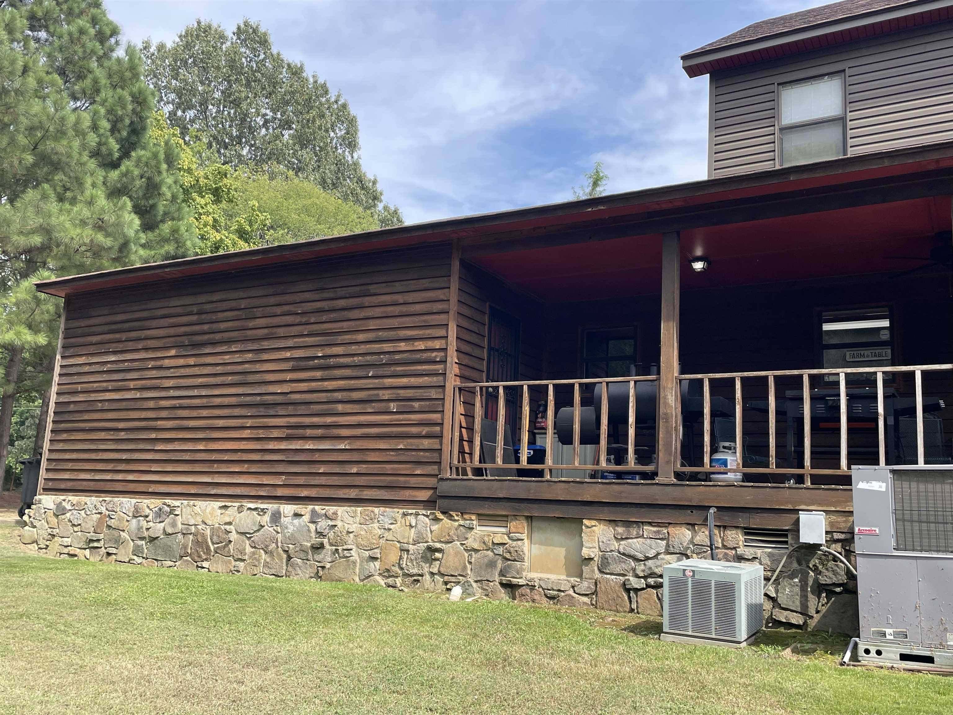 2879 Randolph Road Burlison, TN 38015 - Photo 7 of 29 View of property exterior featuring a yard and central air condition unit