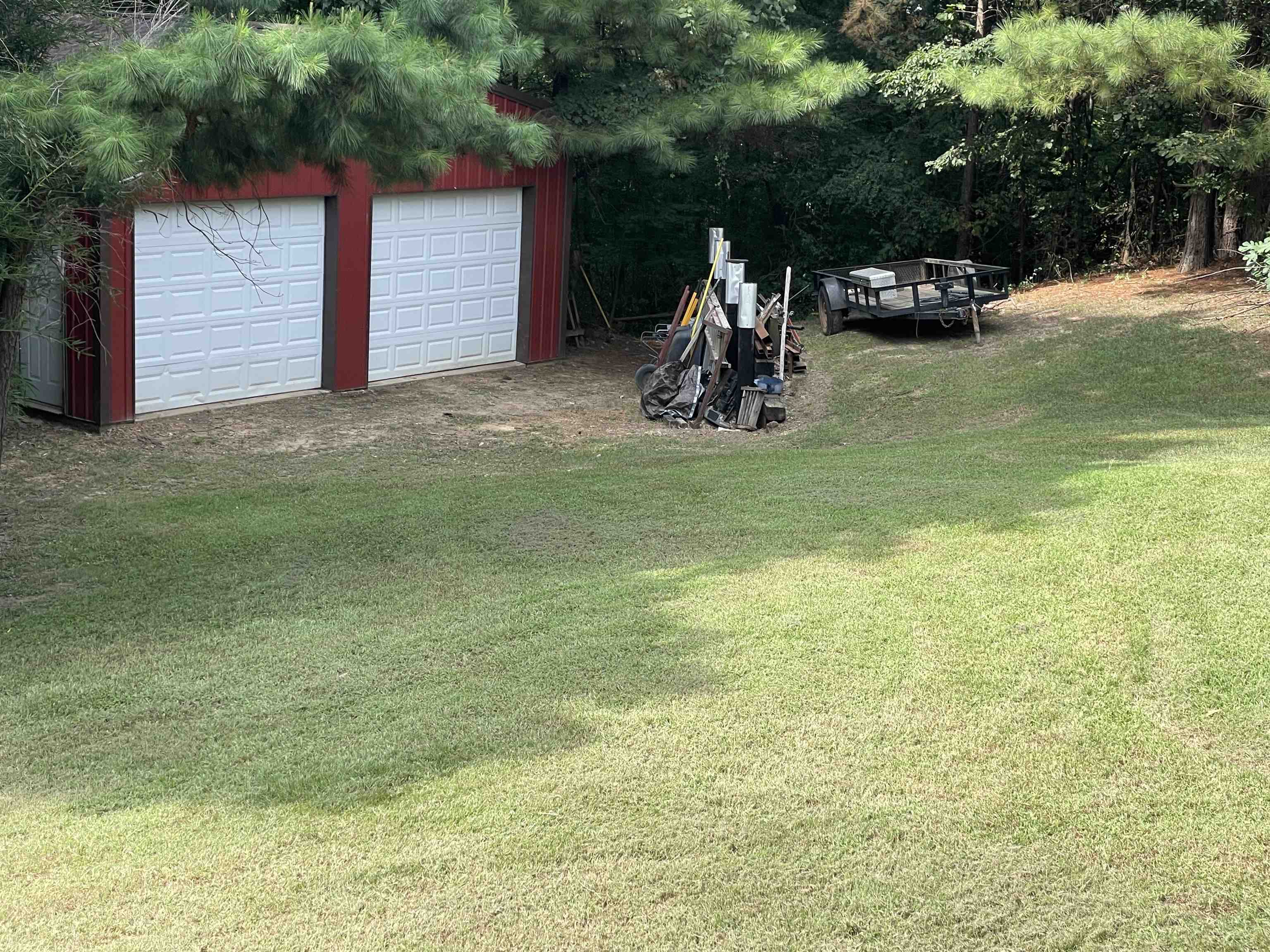 2879 Randolph Road Burlison, TN 38015 - Photo 8 of 29 View of yard with a garage and an outdoor structure