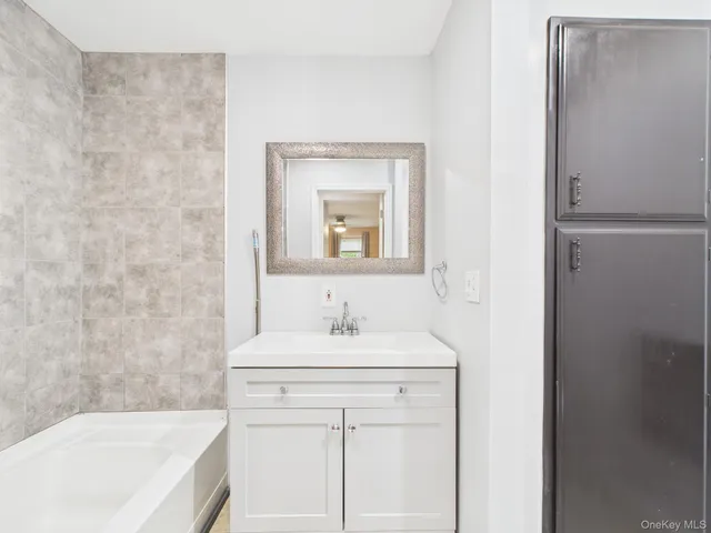 a bathroom with a sink and a bathtub