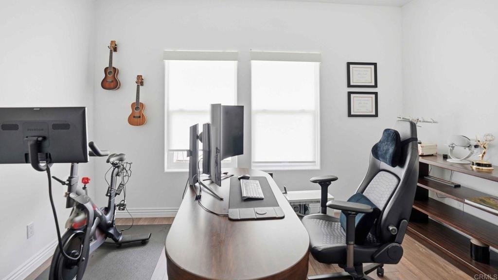 9391 Los Coches Road Lakeside, CA 92040 - Photo 11 of 65 a view of a workspace with furniture and a window