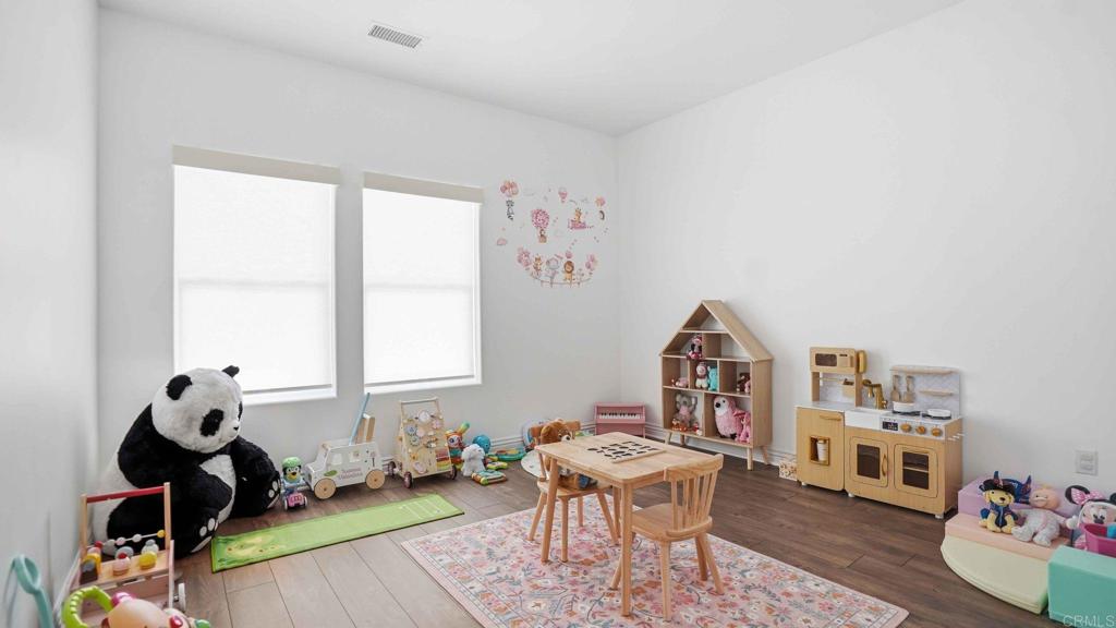 9391 Los Coches Road Lakeside, CA 92040 - Photo 25 of 65 a living room with furniture and a window