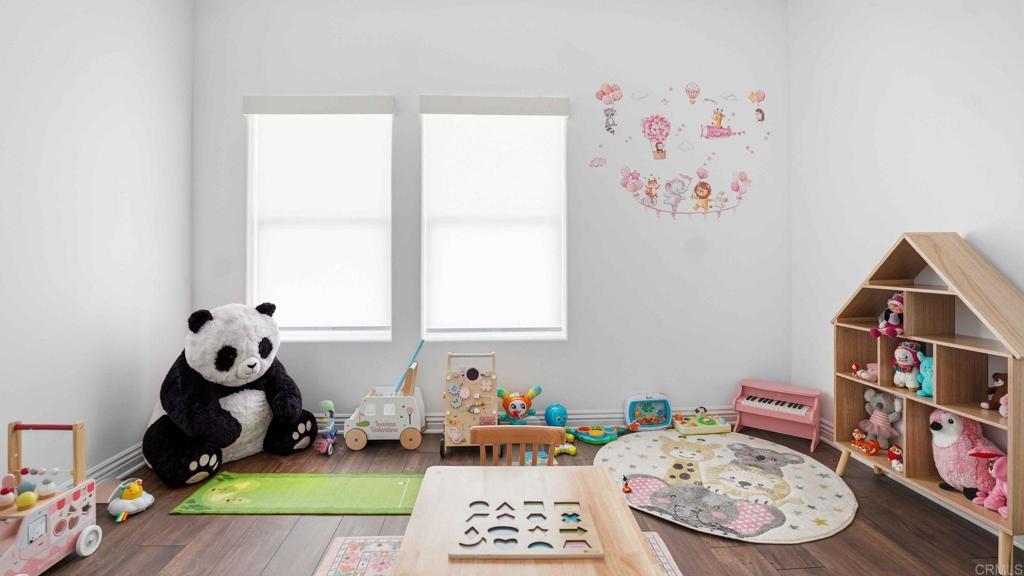 9391 Los Coches Road Lakeside, CA 92040 - Photo 26 of 65 a room with toys and wooden floor