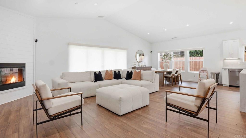 9391 Los Coches Road Lakeside, CA 92040 - Photo 3 of 65 a living room with furniture and a wooden floor