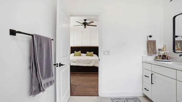a bed room with a bed and a window