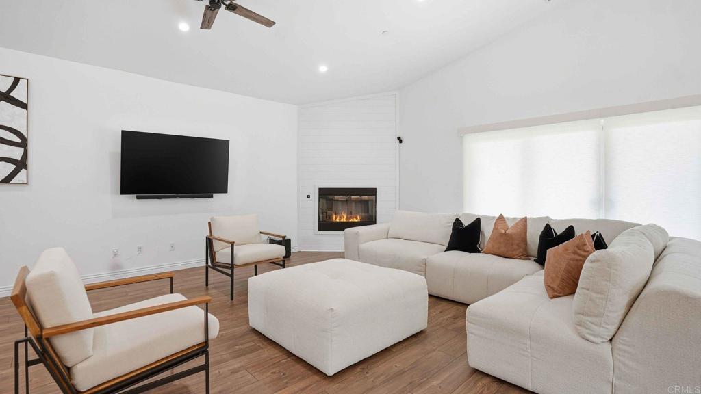 9391 Los Coches Road Lakeside, CA 92040 - Photo 5 of 65 a living room with furniture and a flat screen tv