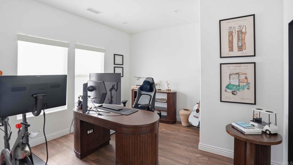 9391 Los Coches Road Lakeside, CA 92040 - Photo 10 of 65 a view of a workspace with furniture and a window