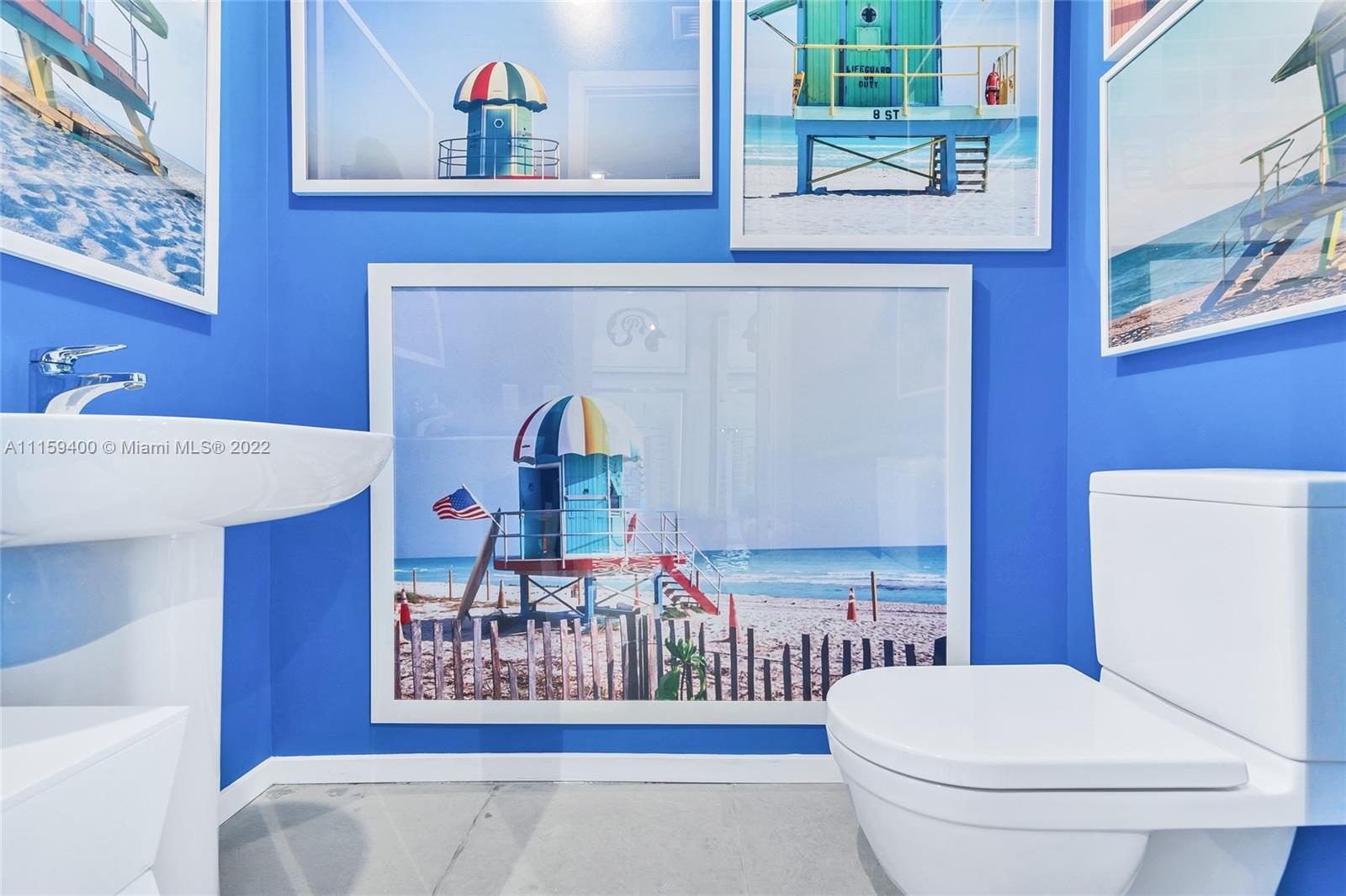 1100 Biscayne Boulevard, Unit 1801 Miami, FL 33132 - Photo 21 of 27 a bathroom with a toilet a sink and a window