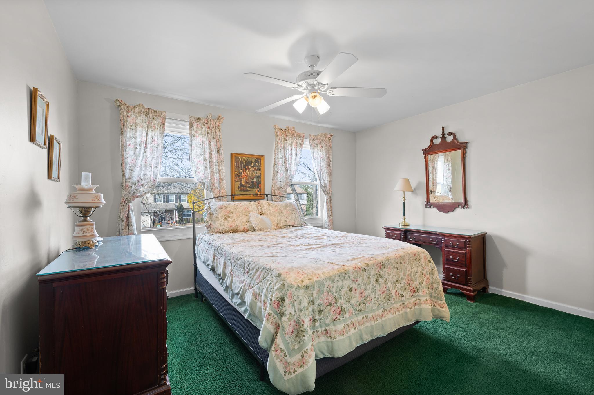 829 Alexander Drive Hatfield, PA 19440 - Photo 19 of 28 a bed room with a bed and a chandelier