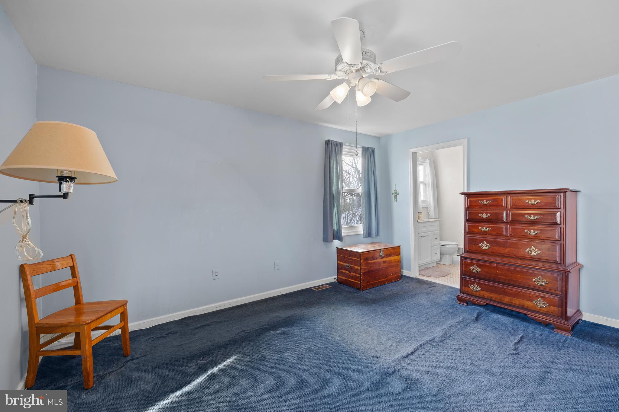 829 Alexander Drive Hatfield, PA 19440 - Photo 21 of 28 a bedroom with a bed and a chair