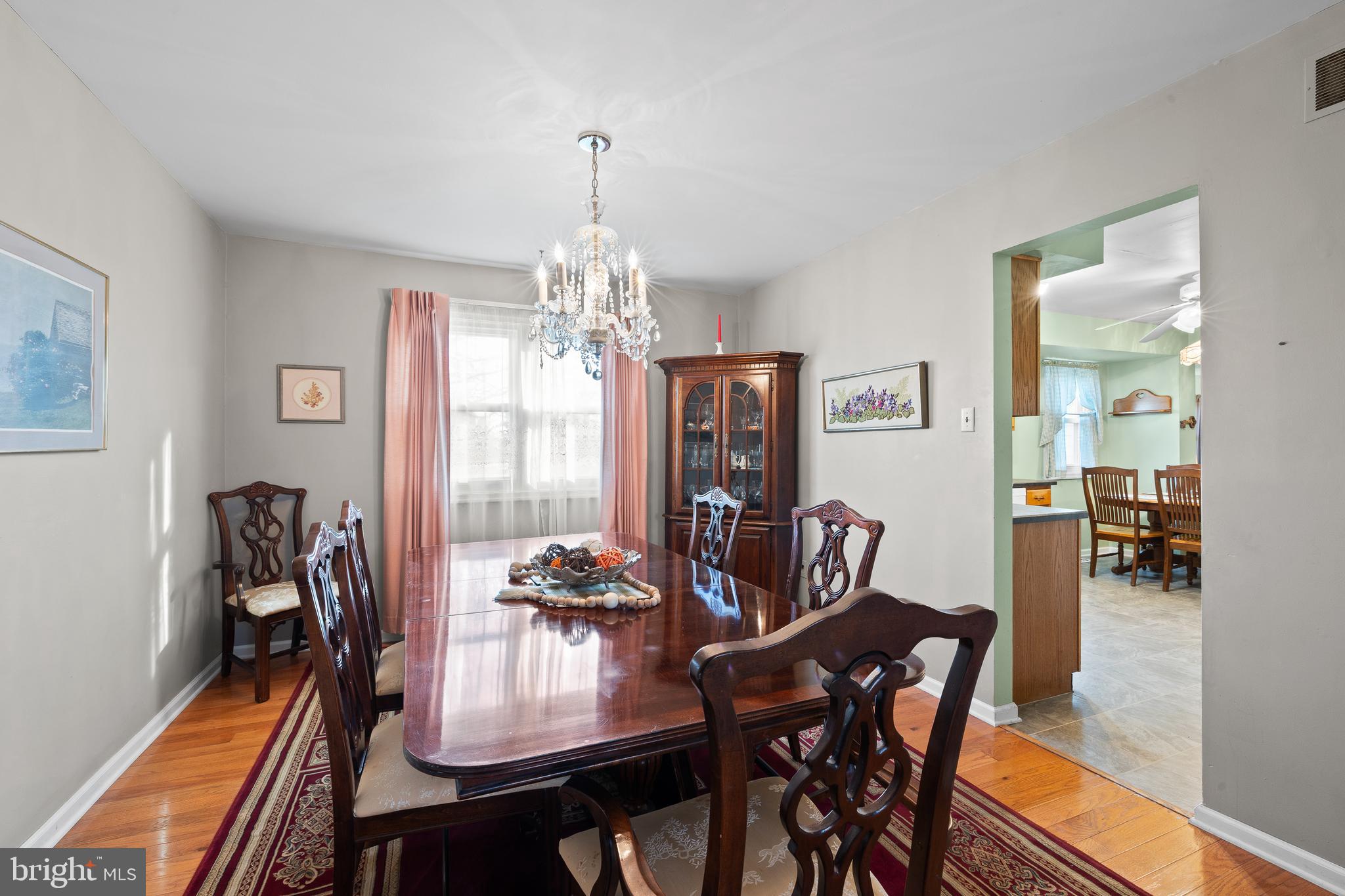 829 Alexander Drive Hatfield, PA 19440 - Photo 10 of 28 a view of a dining room with furniture window and wooden floor