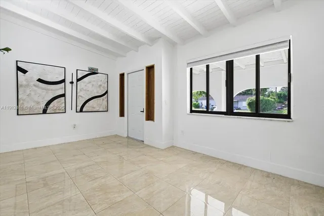 a view of an empty room with window