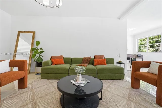 a living room with furniture and a couch