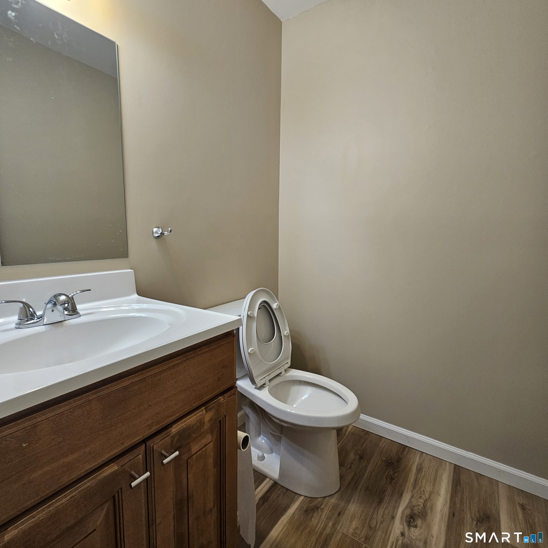 373 Wolcott Street Bristol, CT 06010 - Photo 16 of 23 a bathroom with a sink and a toilet