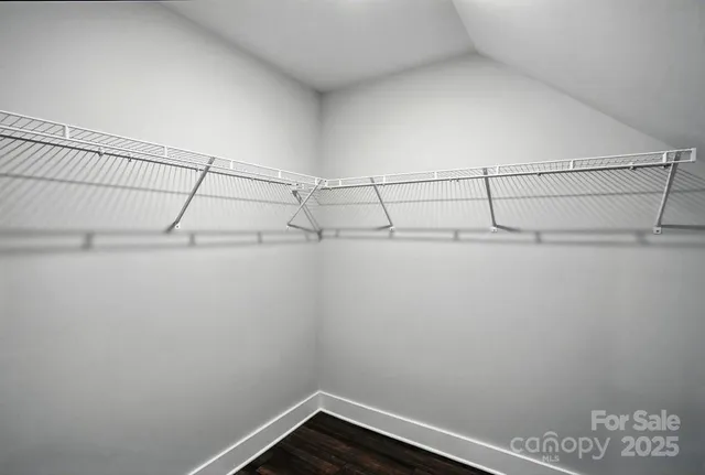 a view of a room with racks on the wall