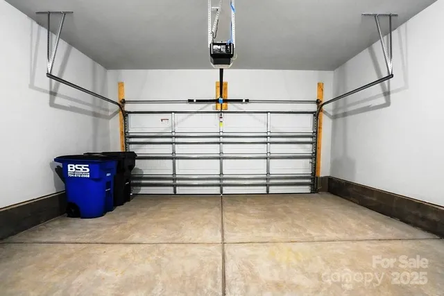 a view of a house with pool and chairs