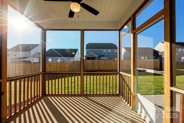 a view of a house with porch and wooden floor
