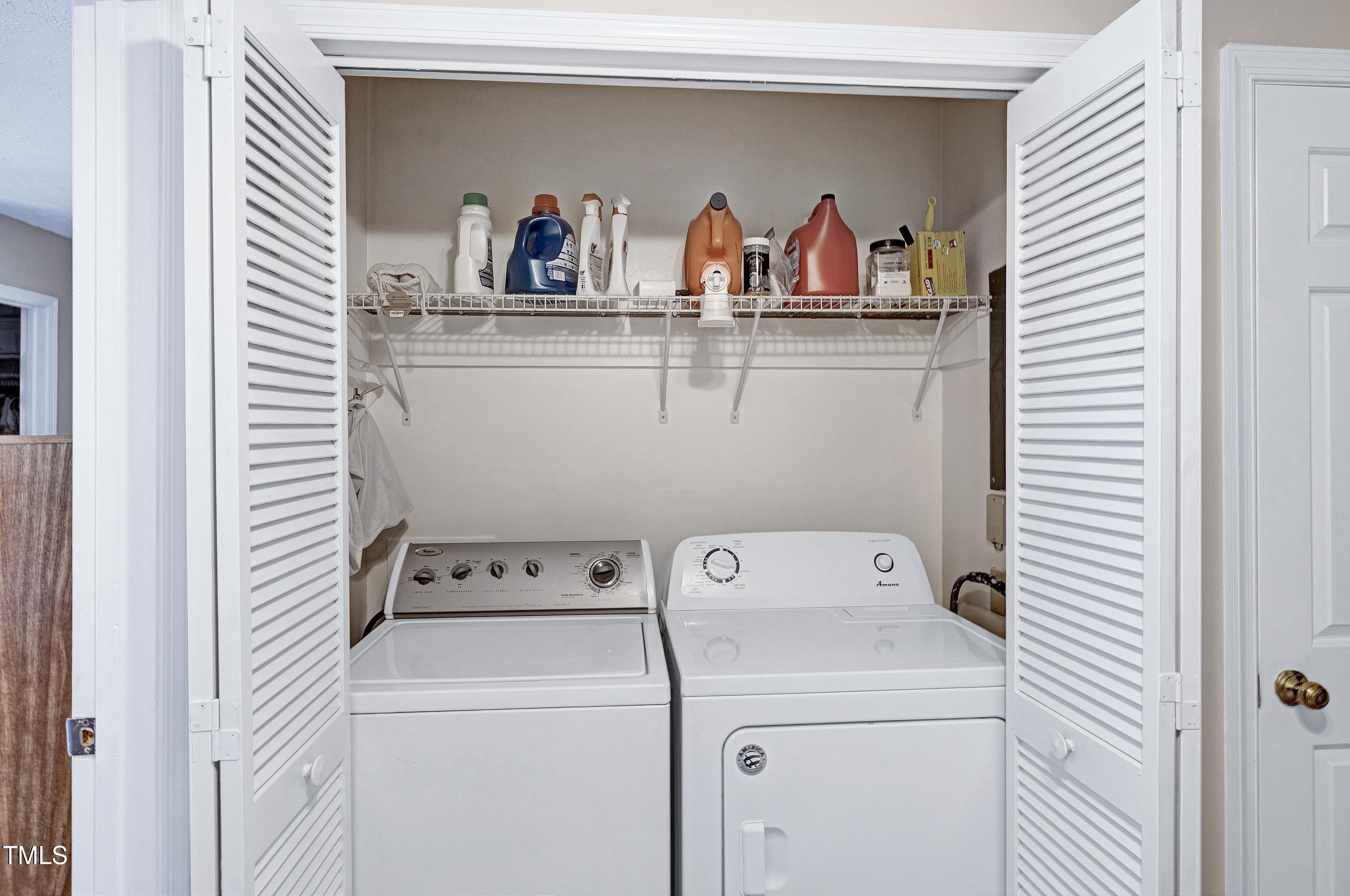 202 Oak Hollow Court Raleigh, NC 27613 - Photo 25 of 44 a utility room with dryer and washer