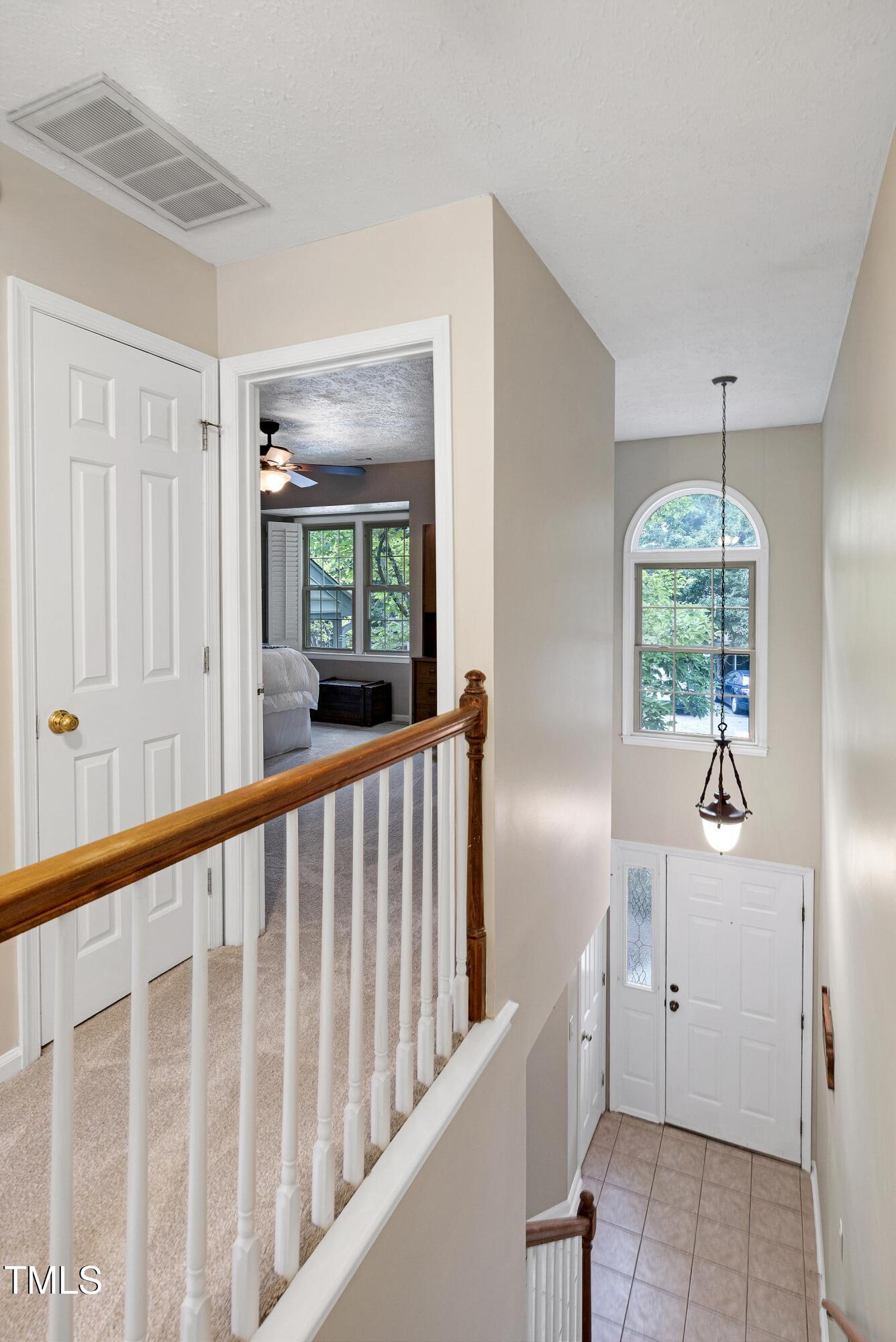202 Oak Hollow Court Raleigh, NC 27613 - Photo 33 of 44 a view of entryway with wooden floor