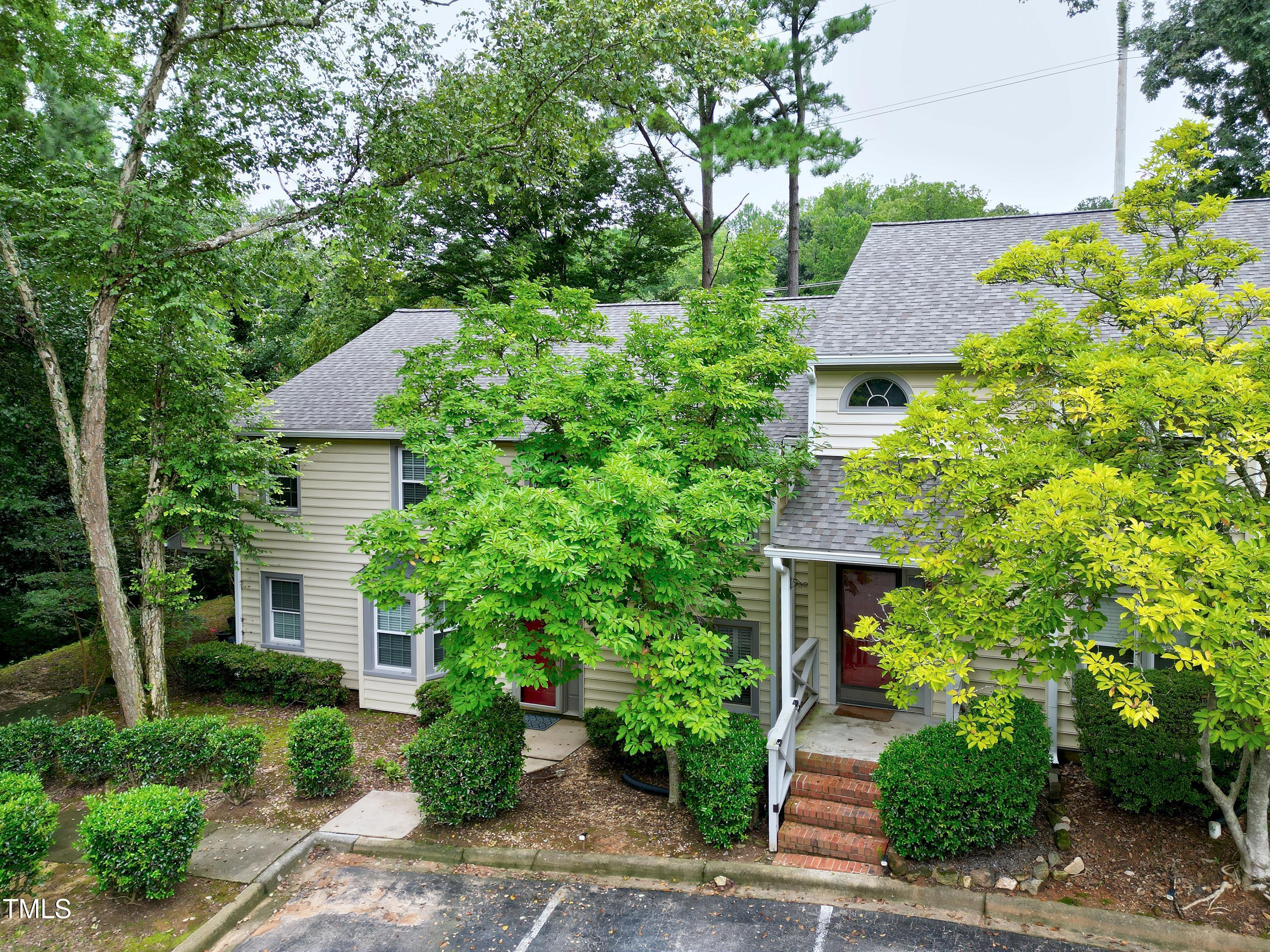 202 Oak Hollow Court Raleigh, NC 27613 - Photo 34 of 44 front view of a house with a yard