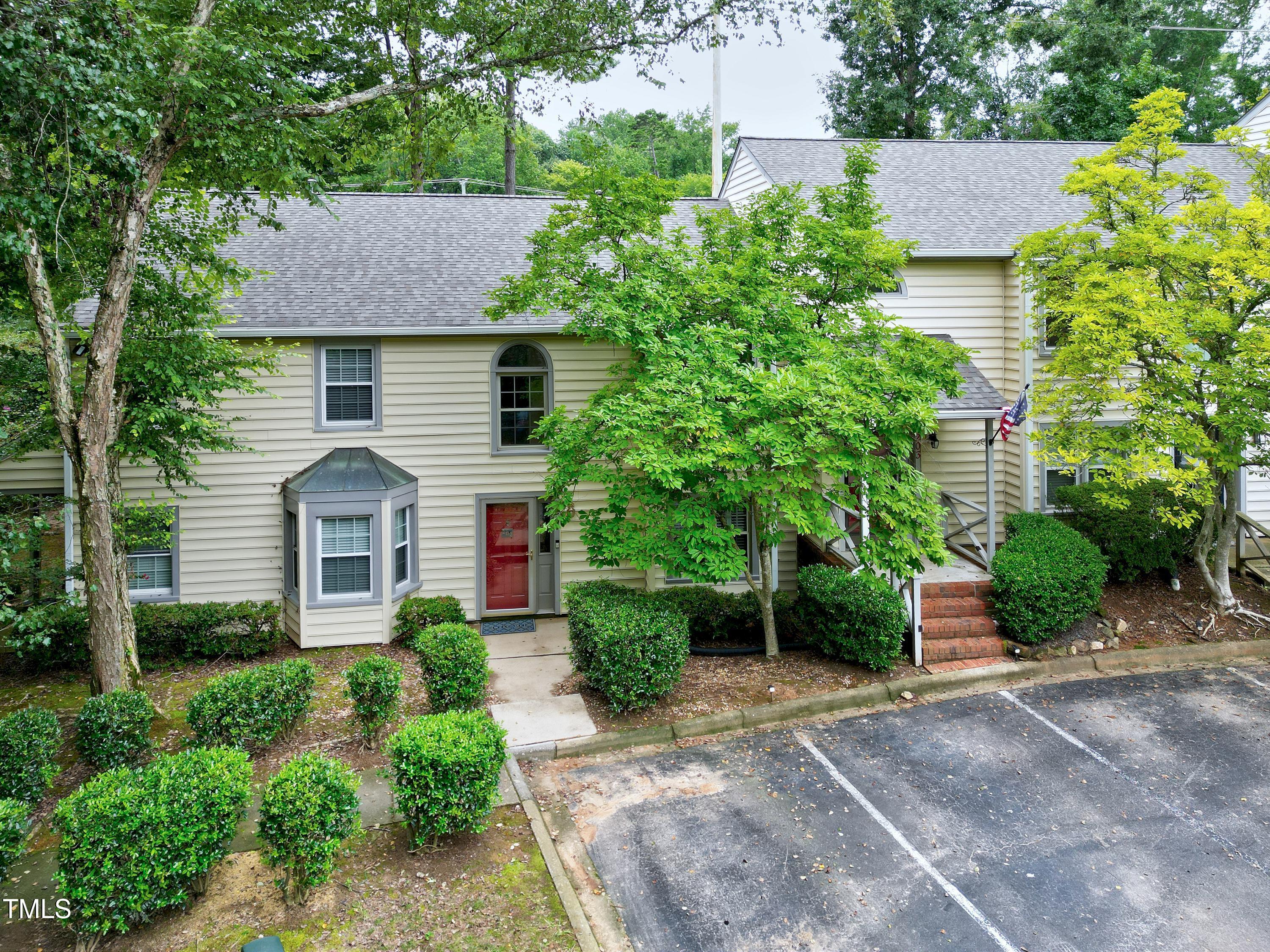 202 Oak Hollow Court Raleigh, NC 27613 - Photo 35 of 44 front view of a house with a yard