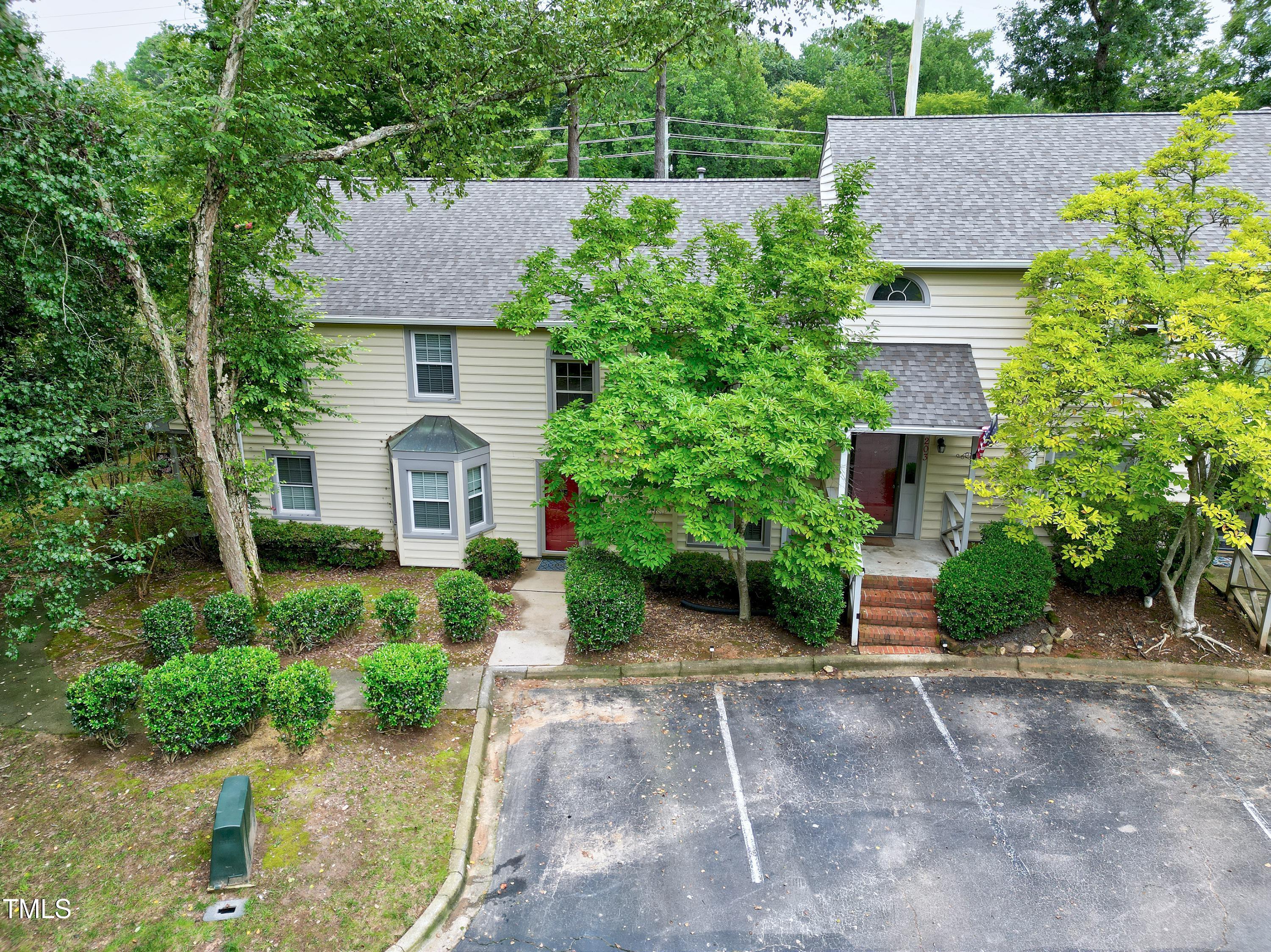 202 Oak Hollow Court Raleigh, NC 27613 - Photo 40 of 44 a aerial view of a house