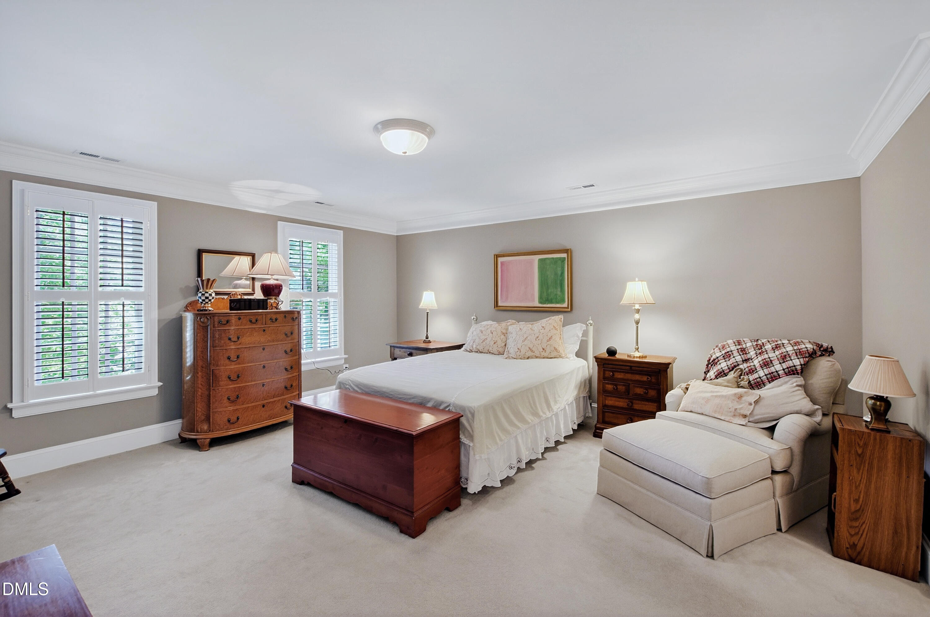 3708 Lubbock Drive Raleigh, NC 27612 - Photo 36 of 64 a spacious bedroom with a bed and dresser