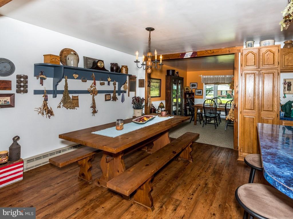 141 Church Road Lititz, PA 17543 - Photo 8 of 28 a living room with furniture a rug and a chandelier