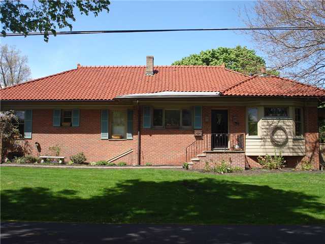 96 Thatcher Road Irondequoit, NY 14617 - Photo 1 of 1 Exterior Front Brick Exterior With Clay Tiled Roof