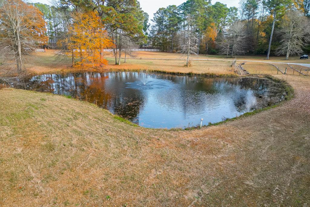 525 Cooper Road Loganville, GA 30052 - Photo 11 of 15 a view of a swimming pool with an outdoor space