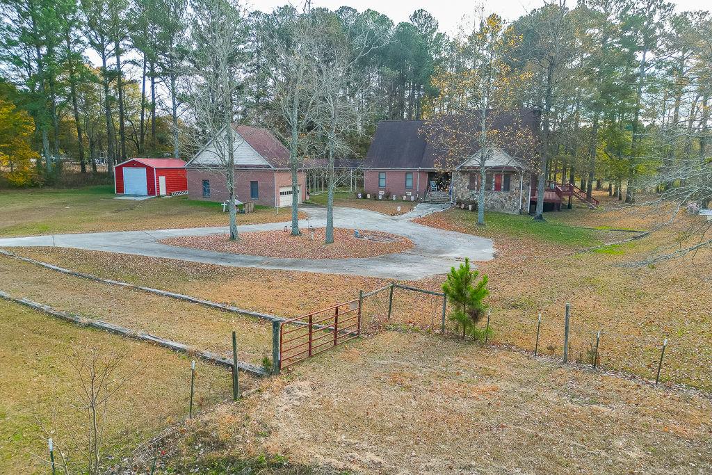 525 Cooper Road Loganville, GA 30052 - Photo 13 of 15 a swimming pool with outdoor seating and yard