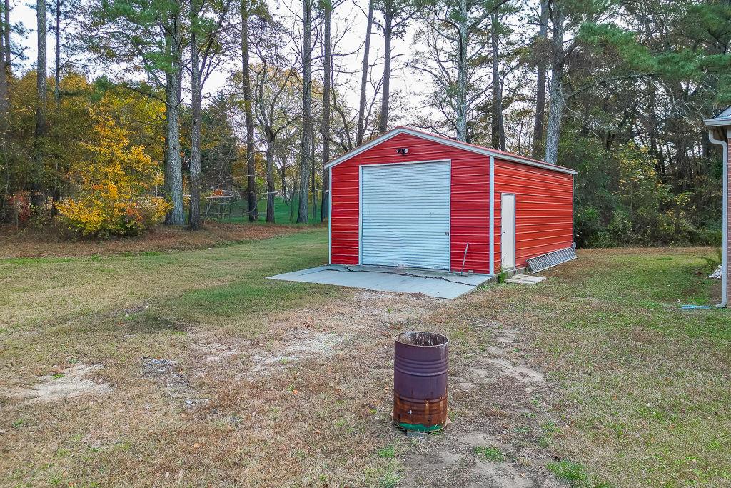525 Cooper Road Loganville, GA 30052 - Photo 14 of 15 a front view of house with yard