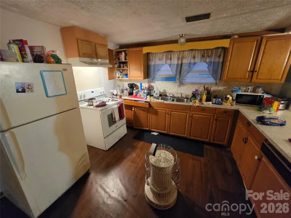 a view of a living room with furniture