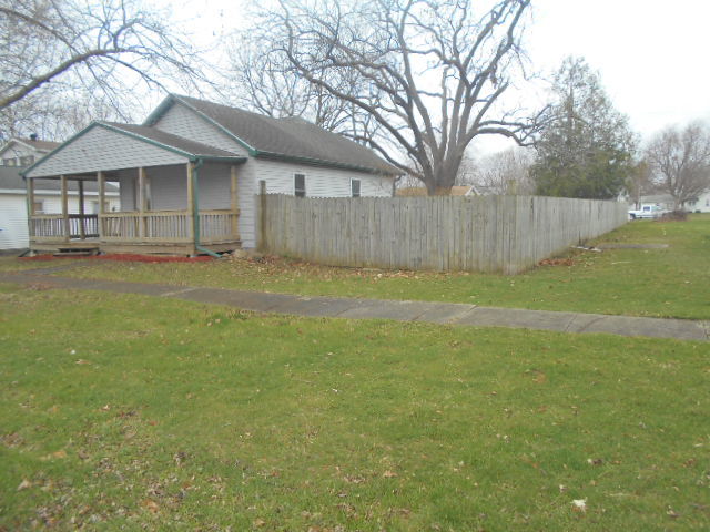 304 South Columbus Street Ransom, IL 60470 - Photo 1 of 24 a view of a house with a yard and large trees
