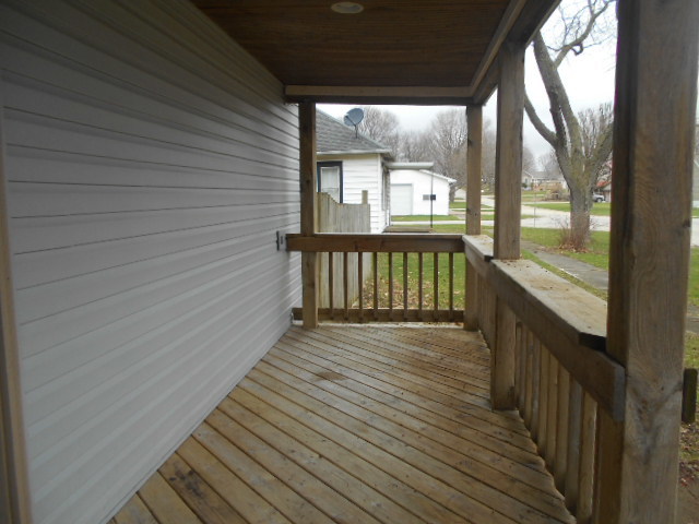 304 South Columbus Street Ransom, IL 60470 - Photo 3 of 24 a view of a balcony with wooden floor