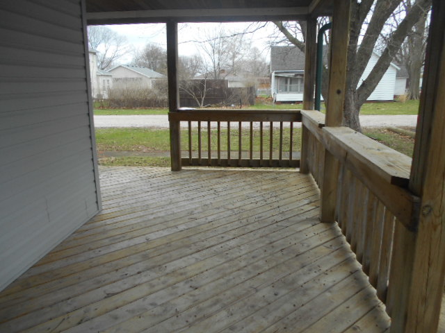 304 South Columbus Street Ransom, IL 60470 - Photo 4 of 24 a view of porch with wooden floor